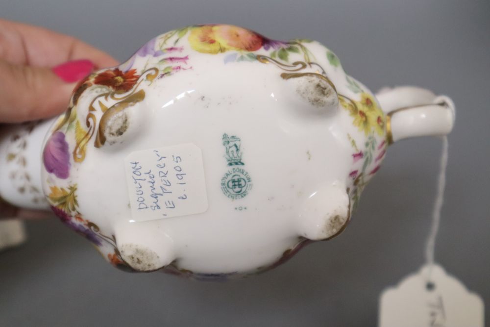 Two Royal Worcester leaf jugs, a Royal Doulton jug, a Belleek posy vase and a 19th century Derby cup and saucer, tallest 15cm